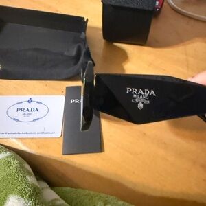 Prada Black Womans Sunglasses with White Temple Logo